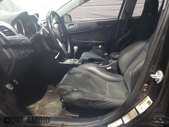 2014 Mitsubishi Lancer Evolution GSR with VIN JA32W8FV5EU017979, listed as a Copart auction lot 47222615 with 109,632 mi miles and Salvage Title. Bid and sale history available at carsss.com. Image 7.