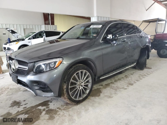 2018 Mercedes-Benz GLC with VIN WDC0J4KB1JF349924, listed as a Copart auction lot 83670584 with 138,610 mi miles and Salvage Title. Bid and sale history available at carsss.com. Image 1.