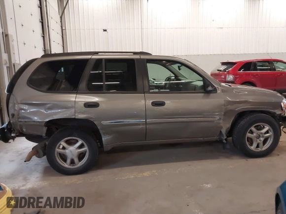 2008 GMC Envoy SLT z VIN 1GKDT13S082134197, wystawiony jako IAAI lot #41936678 z przebiegiem 140 524 mil mil oraz . Historia ofert i sprzedaży dostępna na DreamBid. Obrazek 13.