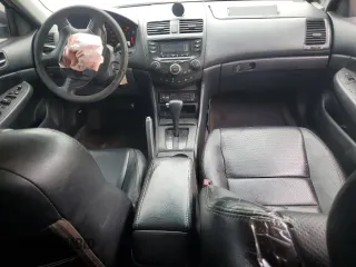 2003 Honda Accord LX with VIN 1HGCM563X3A105970, listed as a Copart auction lot 60074655 with 125,443 mi miles and Salvage title. Bid and sale history available at DreamBid. Image 8.