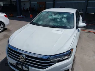 2019 Volkswagen Jetta S z VIN 3VWC57BU7KM200586, wystawiony jako IAAI lot #42609606 z przebiegiem 72 874 mil mil oraz . Historia ofert i sprzedaży dostępna na DreamBid. Obrazek 6.