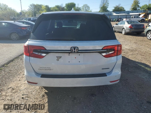 2021 Honda Odyssey Touring with VIN 5FNRL6H86MB003309, listed as a Copart auction lot 51648654 with 132,393 mi miles and Salvage Title. Bid and sale history available at carsss.com. Image 6.