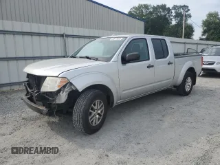 2015 Nissan Frontier SL with VIN 1N6AD0FV1FN713994, listed as a Copart auction lot 60617605 with 148,151 mi miles and Salvage title. Bid and sale history available at DreamBid. Image 1.