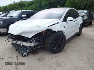 2024 Tesla Model X Plaid with VIN 7SAXCBE63RF440245, listed as a IAAI auction lot 42140051 with Not Provided miles and . Bid and sale history available at carsss.com. Image 2.