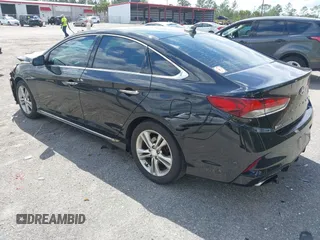 2018 Hyundai Sonata SEL with VIN 5NPE34AF3JH647018, listed as a IAAI auction lot 41687419 with 97,561 mi miles and . Bid and sale history available at DreamBid. Image 3.