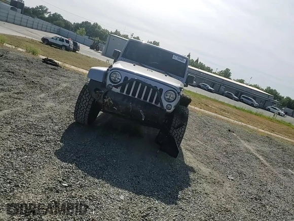 2014 Jeep Wrangler Unlimited Sahara with VIN 1C4HJWEG1EL126611, listed as a Copart auction lot 57169485 with 122,000 mi miles and Salvage title. Bid and sale history available at DreamBid. Image 14.