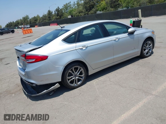 2017 Ford Fusion Hybrid SE с VIN 3FA6P0LU5HR285381, выставлен на аукционе IAAI как лот 42597789 с пробегом 129 662 миль миль и . История ставок и продаж доступна на DreamBid. Изображение 4.