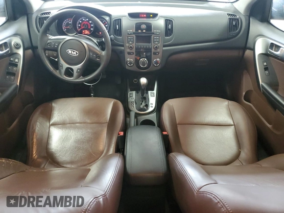 2010 Kia Forte EX z VIN KNAFU4A27A5230657, wystawiony jako Copart lot #58817345 z przebiegiem 63 949 mil mil oraz Nie do naprawy • Non repairable. Historia ofert i sprzedaży dostępna na DreamBid. Obrazek 8.