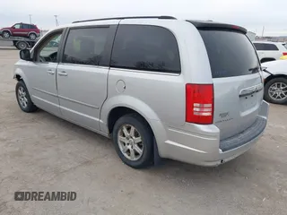 2010 Chrysler Town & Country Touring with VIN 2A4RR5D18AR466614, listed as a IAAI auction lot 41824475 with 242,881 mi miles. Bid and sale history available at carsss.com. Image 3.