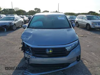 2023 Honda Odyssey Touring with VIN 5FNRL6H86PB020700, listed as a IAAI auction lot 41961098 with 66,512 mi miles and . Bid and sale history available at DreamBid. Image 12.