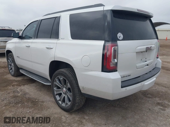 2019 GMC Yukon SLT with VIN 1GKS1BKCXKR329607, listed as a IAAI auction lot 41188239 with 84,940 mi miles. Bid and sale history available at carsss.com. Image 3.