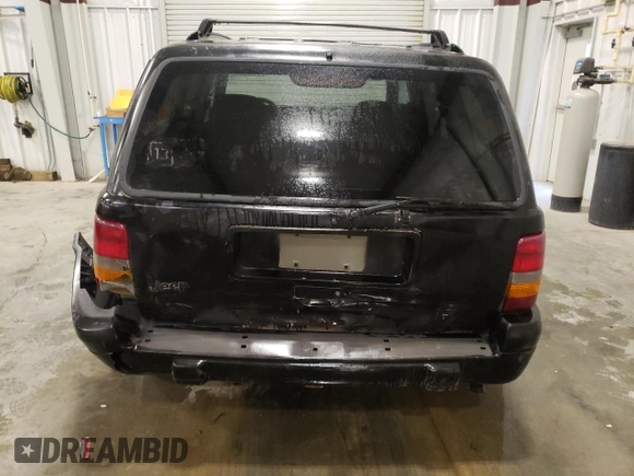 1997 Jeep Grand Cherokee Laredo с VIN 1J4GZ58S3VC508180, выставлен на аукционе Copart как лот 54856525 с пробегом 214 845 миль миль и На запчасти • Non repairable. История ставок и продаж доступна на DreamBid. Изображение 6.