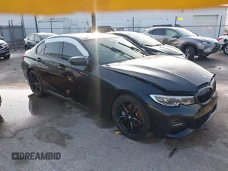 2021 BMW 3 Series 330i with VIN 3MW5R1J0XM8C03115, listed as a IAAI auction lot 42072010 with 45,582 mi miles and . Bid and sale history available at DreamBid. Image 1.