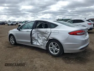 2018 Ford Fusion SE с VIN 3FA6P0HDXJR130582, выставлен на аукционе Copart как лот 53169815 с пробегом 137 512 миль миль и Списание • Salvage title. История ставок и продаж доступна на DreamBid. Изображение 2.