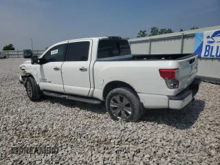 2018 Nissan Titan SV with VIN 1N6AA1E5XJN509882, listed as a Copart auction lot 60162995 with 149,352 mi miles and Salvage title. Bid and sale history available at DreamBid. Image 2.