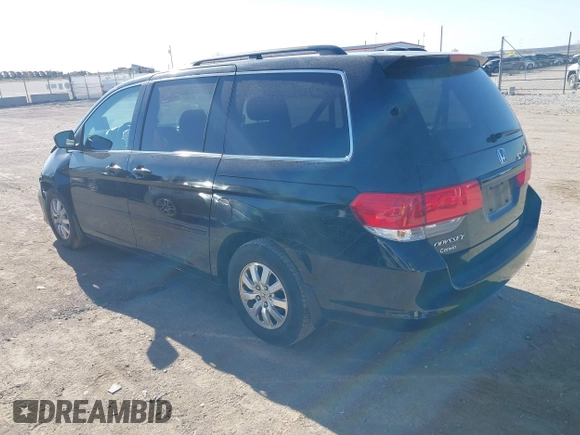 2010 Honda Odyssey EX-L with VIN 5FNRL3H67AB063205, listed as a IAAI auction lot 41996537 with 146,327 mi miles and . Bid and sale history available at DreamBid. Image 3.