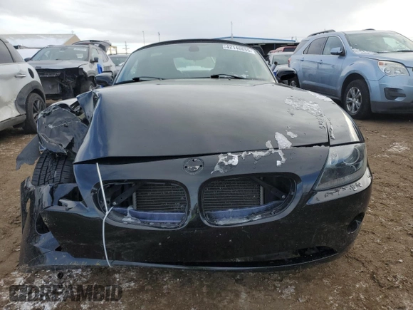 2005 BMW Z4 2.5i with VIN 4USBT335X5LR71029, listed as a Copart auction lot 42146655 with 80,813 mi miles and Salvage Title. Bid and sale history available at carsss.com. Image 5.