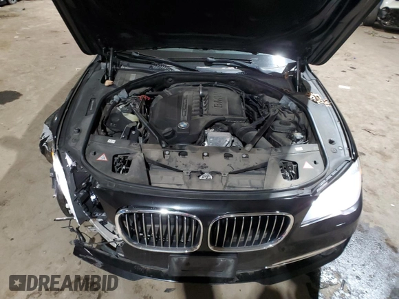 2015 BMW 7 Series 740Li xDrive with VIN WBAYF4C55FG291706, listed as a Copart auction lot 41992355 with 76,483 mi miles and Salvage Title. Bid and sale history available at carsss.com. Image 14.