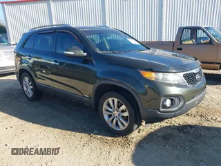 2011 Kia Sorento EX with VIN 5XYKUDA25BG093924, listed as a IAAI auction lot 41648802 with 221,355 mi miles. Bid and sale history available at carsss.com. Image 1.