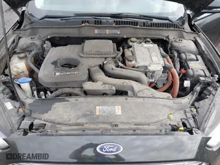 2015 Ford Fusion Titanium Hybrid with VIN 3FA6P0RU6FR299374, listed as a IAAI auction lot 41576007 with 191,285 mi miles. Bid and sale history available at carsss.com. Image 10.