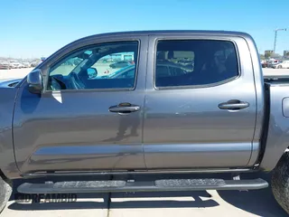 2023 Toyota Tacoma 4WD SR with VIN 3TYCZ5AN1PT146719, listed as a IAAI auction lot 41406963 with 19,735 mi miles. Bid and sale history available at carsss.com. Image 15.