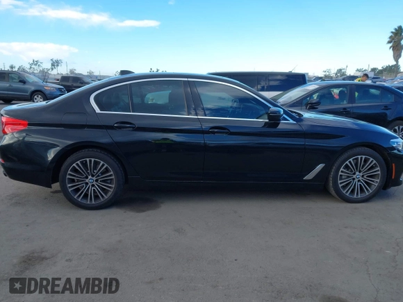 2019 BMW 5 Series 530i with VIN WBAJA5C54KWW45379, listed as a IAAI auction lot 41276092 with 77,025 mi miles. Bid and sale history available at carsss.com. Image 13.