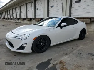2015 Scion FR-S z VIN JF1ZNAA10F8711669, wystawiony jako Copart lot #50291395 z przebiegiem 87 617 mil mil oraz Szkoda całkowita • Salvage title. Historia ofert i sprzedaży dostępna na DreamBid. Obrazek 1.