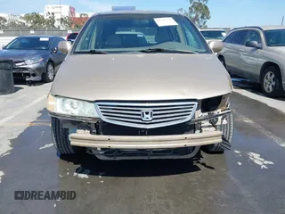 2001 Honda Odyssey EX z VIN 2HKRL18611H553161, wystawiony jako IAAI lot #42339181 z przebiegiem 89 235 mil mil oraz . Historia ofert i sprzedaży dostępna na DreamBid. Obrazek 6.