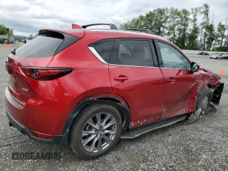 2019 Mazda CX-5 Grand Touring with VIN JM3KFBDM2K0639247, listed as a Copart auction lot 64060045 with 69,563 mi miles and Salvage title. Bid and sale history available at DreamBid. Image 3.