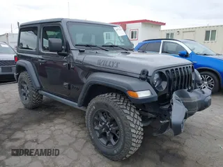 2022 Jeep Wrangler Willys Sport z VIN 1C4GJXAN7NW252931, wystawiony jako IAAI lot #40972143 z przebiegiem 12 823 mil mil oraz . Historia ofert i sprzedaży dostępna na DreamBid. Obrazek 1.