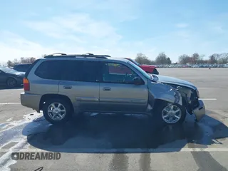 2002 GMC Envoy SLT z VIN 1GKDT13S122114452, wystawiony jako IAAI lot #42048616 z przebiegiem 259 545 mil mil oraz . Historia ofert i sprzedaży dostępna na DreamBid. Obrazek 14.