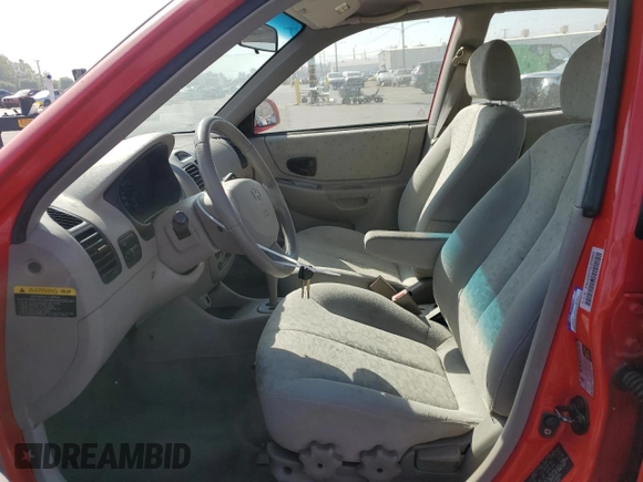 2005 Hyundai Accent GLS with VIN KMHCG45C55U593854, listed as a Copart auction lot 72237914 with 83,203 mi miles and Clean Title. Bid and sale history available at carsss.com. Image 7.