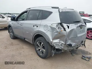 2018 Toyota RAV4 XLE с VIN 2T3WFREV0JW409842, выставлен на аукционе IAAI как лот 42057521 с пробегом 145 915 миль миль и . История ставок и продаж доступна на DreamBid. Изображение 3.