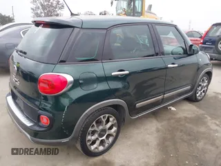 2014 FIAT 500L Trekking with VIN ZFBCFADH0EZ007506, listed as a IAAI auction lot 42563872 with 126,535 mi miles and . Bid and sale history available at DreamBid. Image 4.