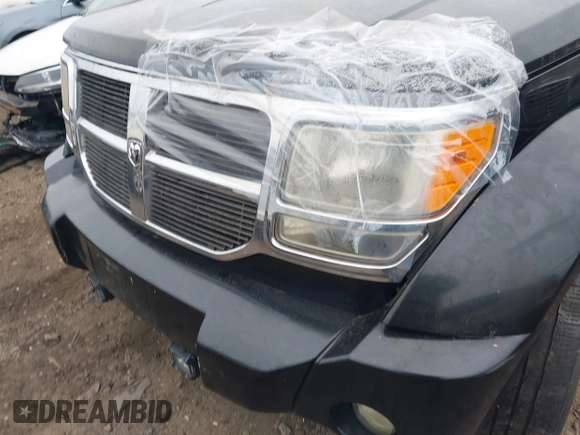 2009 Dodge Nitro SLT with VIN 1D8GU58K19W525618, listed as a IAAI auction lot 41726192 with 999,999 mi miles. Bid and sale history available at carsss.com. Image 6.