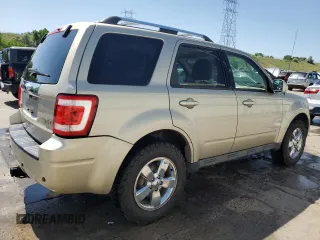 2010 Ford Escape Limited z VIN 1FMCU9EG5AKC49732, wystawiony jako Copart lot #61172415 z przebiegiem 148 796 mil mil oraz Szkoda całkowita • Salvage title. Historia ofert i sprzedaży dostępna na DreamBid. Obrazek 3.