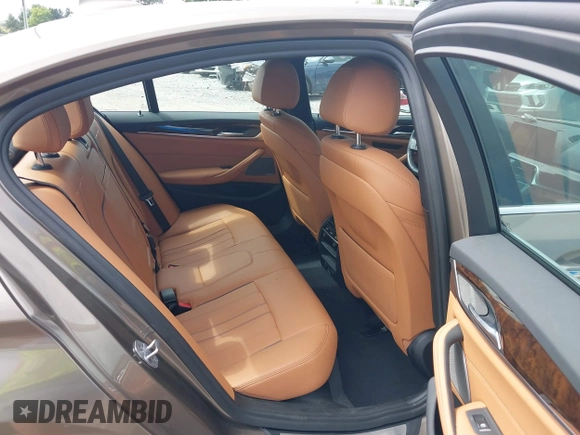 2018 BMW 5 Series 530i xDrive with VIN WBAJA7C55JG909519, listed as a IAAI auction lot 42650263 with 57,077 mi miles and . Bid and sale history available at DreamBid. Image 8.