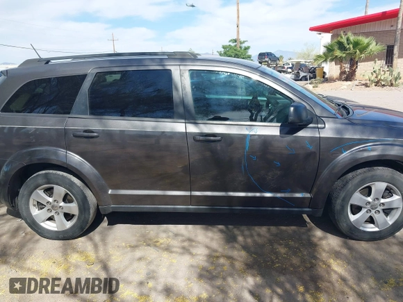 2017 Dodge Journey SE with VIN 3C4PDCAB9HT503979, listed as a IAAI auction lot 42116429 with 176,591 mi miles and . Bid and sale history available at DreamBid. Image 14.