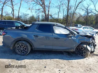2022 Hyundai Santa Cruz SEL with VIN 5NTJB4AE7NH014148, listed as a IAAI auction lot 41263713 with 70,619 mi miles and . Bid and sale history available at DreamBid. Image 13.