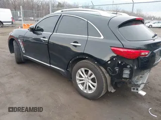 2016 Infiniti QX70 z VIN JN8CS1MWXGM752436, wystawiony jako IAAI lot #41681170 z przebiegiem 130 208 mil mil oraz . Historia ofert i sprzedaży dostępna na DreamBid. Obrazek 3.
