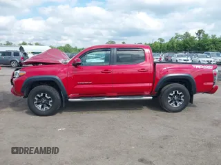 2021 Toyota Tacoma SR z VIN 5TFCZ5AN2MX263159, wystawiony jako IAAI lot #42273087 z przebiegiem 69 220 mil mil oraz . Historia ofert i sprzedaży dostępna na DreamBid. Obrazek 13.