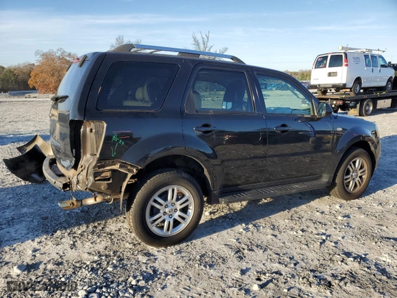 2009 Mercury Mariner Premier with VIN 4M2CU87719KJ20162, listed as a Copart auction lot 84315594 with 143,548 mi miles and Salvage Title. Bid and sale history available at carsss.com. Image 3.