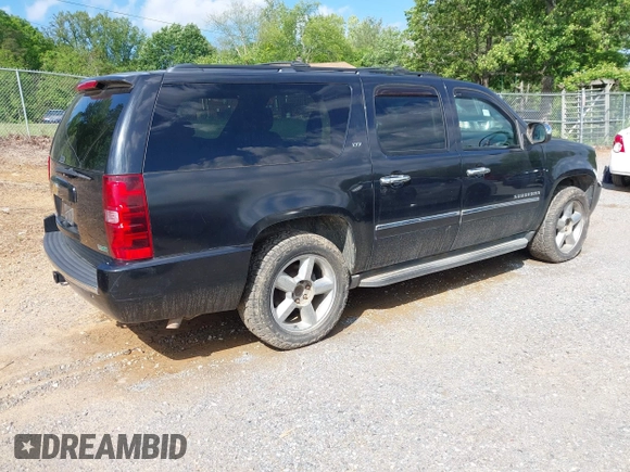 2011 Chevrolet Suburban LTZ with VIN 1GNSKKE38BR359006, listed as a IAAI auction lot 42183589 with 162,154 mi miles and . Bid and sale history available at DreamBid. Image 4.