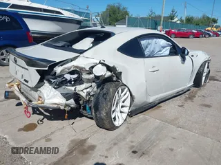 2013 Scion FR-S with VIN JF1ZNAA12D2720583, listed as a IAAI auction lot 40253195 with 113,006 mi miles. Bid and sale history available at carsss.com. Image 4.