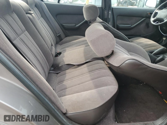 1992 Toyota Camry с VIN 4T1SK11E8NU009222, выставлен на аукционе Copart как лот 60811625 с пробегом 143 925 миль миль и Чистый • Clean title. История ставок и продаж доступна на DreamBid. Изображение 10.