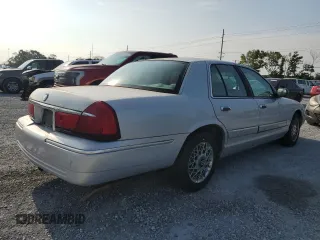 2000 Mercury Grand Marquis GS z VIN 2MEFM74W0YX715104, wystawiony jako Copart lot #54357855 z przebiegiem 111 231 mil mil oraz Szkoda całkowita • Salvage title. Historia ofert i sprzedaży dostępna na DreamBid. Obrazek 3.