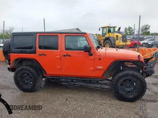 2015 Jeep Wrangler Unlimited Sahara with VIN 1C4BJWEG6FL603265, listed as a IAAI auction lot 41956606 with 70,983 mi miles. Bid and sale history available at carsss.com. Image 13.