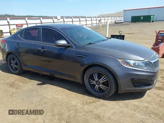 2011 Kia Optima LX with VIN KNAGM4A79B5063381, listed as a IAAI auction lot 42157171 with 175,069 mi miles and . Bid and sale history available at carsss.com. Image 1.