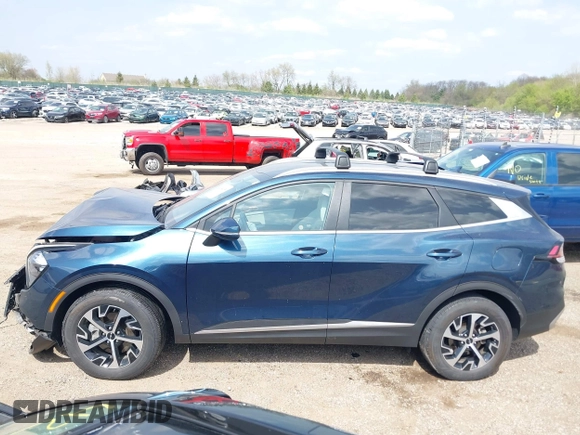 2023 Kia Sportage EX with VIN KNDPVCAGXP7104090, listed as a IAAI auction lot 42144158 with 26,983 mi miles and . Bid and sale history available at DreamBid. Image 15.