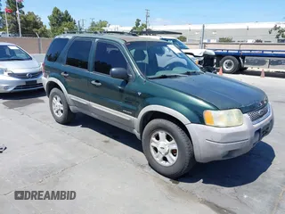 2002 Ford Escape XLT Choice with VIN 1FMYU03122KD65598, listed as a IAAI auction lot 42568847 with 233,834 mi miles and . Bid and sale history available at DreamBid. Image 1.